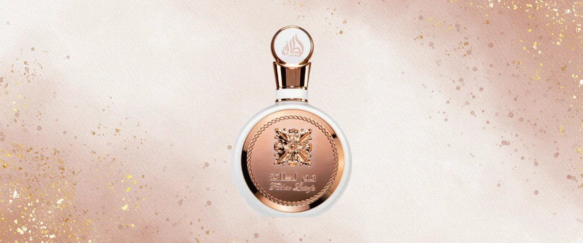 Fakhar Rose Lattafa Eau de Parfum Para Mujer con fondo oro rosa