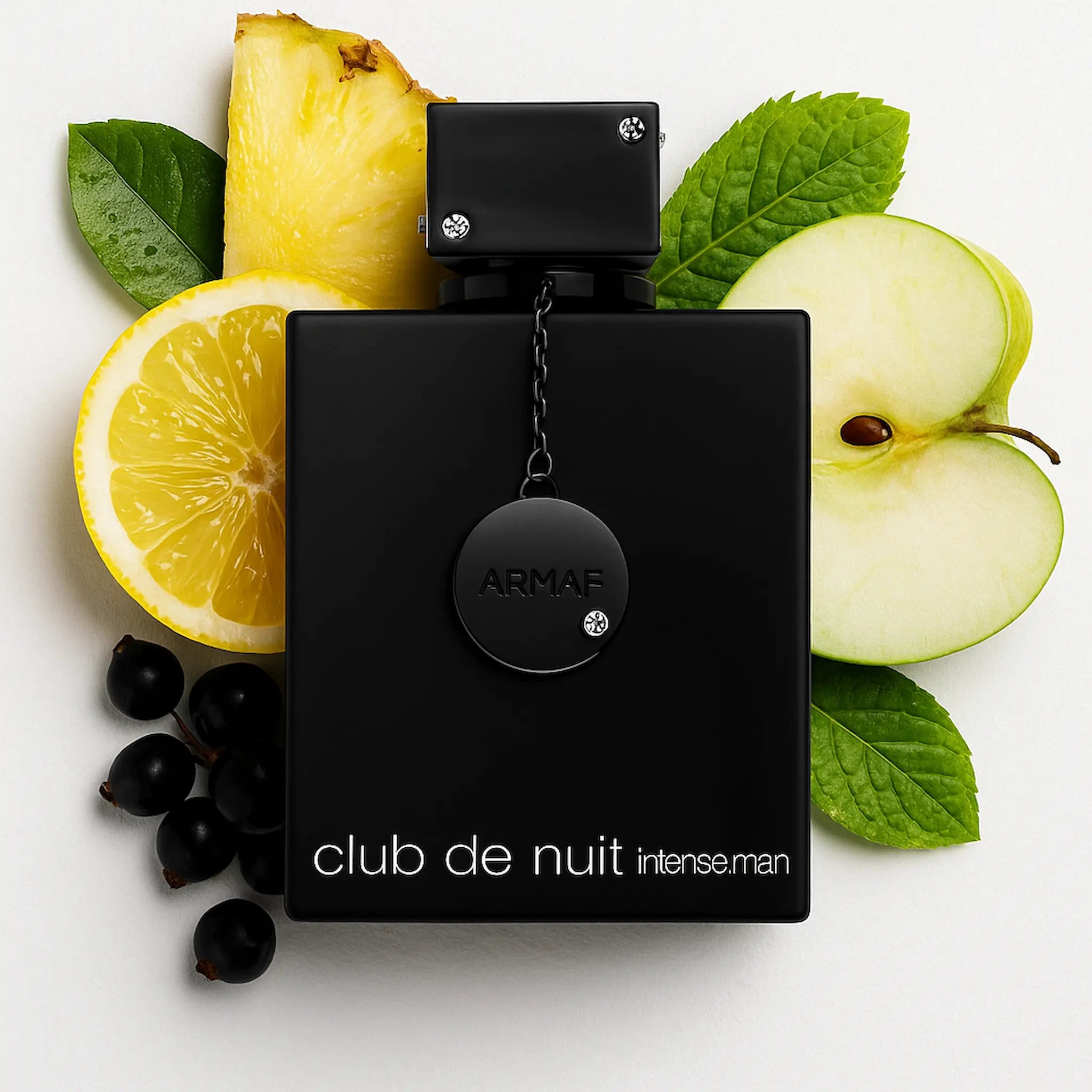 Club_de_Nuit_Intense_Man_Armaf_Eau_de_Toilette_Para_Hombre_Con_Fondo_Limon_Piña_Bermagota_Manazana_Grosellas