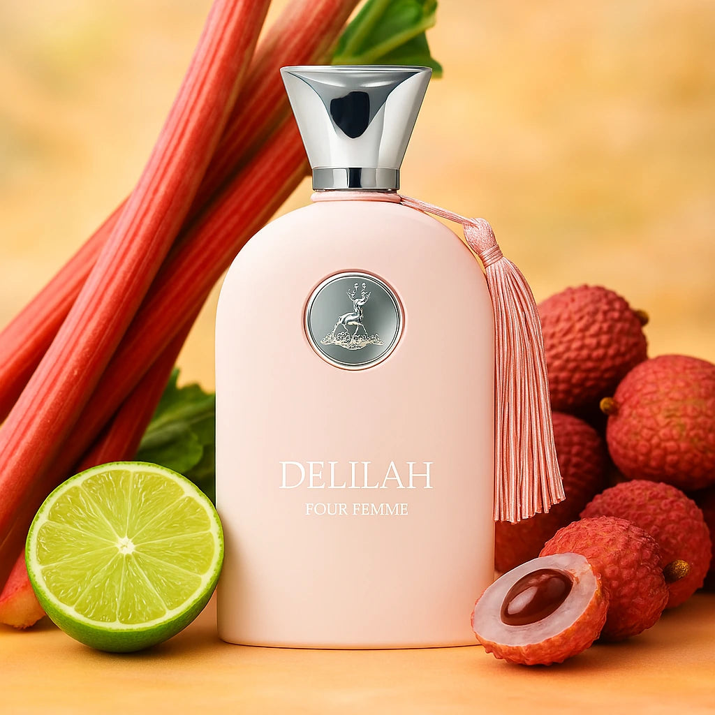Delilah Maison Alhambra Eau de Parfum Para Mujer con fondo de frutas